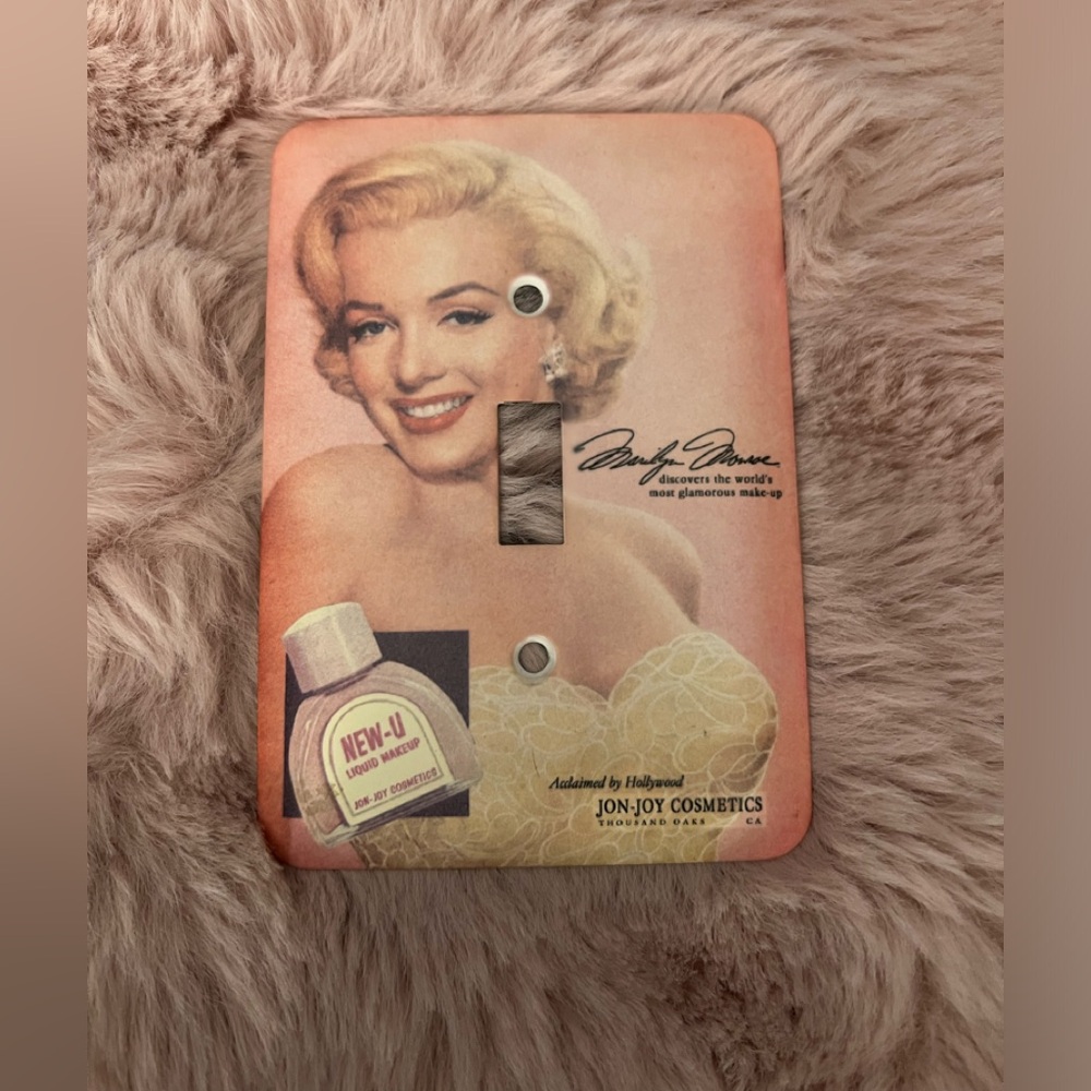 Pink Marilyn Monroe Light-switch Cover Jon-Joy Cosmetics Advertisement